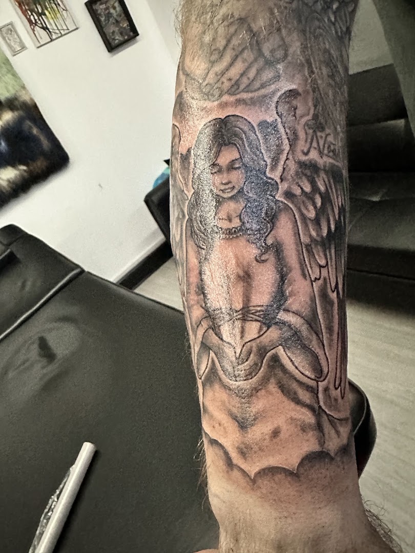 Hood-Sons Tattoo Studio & Massage Therapy · Photos 7